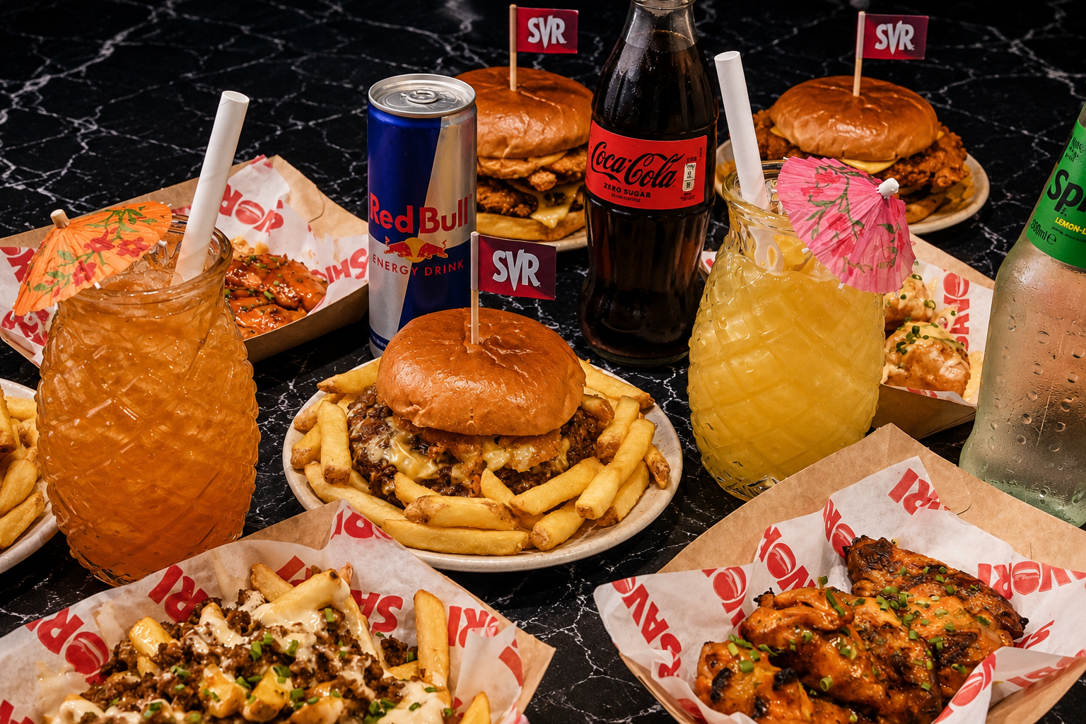 Savori Burger signature spread — smash burgers, wings and fries