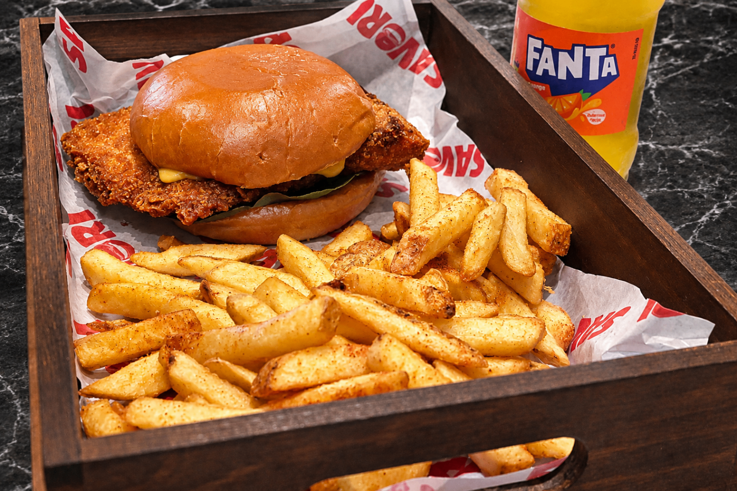 Chicken burger meal with Fanta